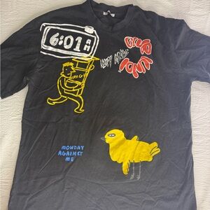 Zara Black Graphic Tee with White and Orange Accents